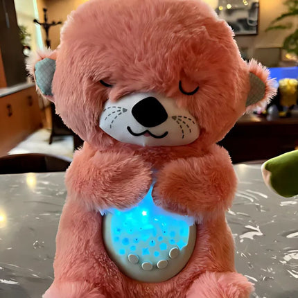 Spící plyšová vydra s uklidňujícím světlem