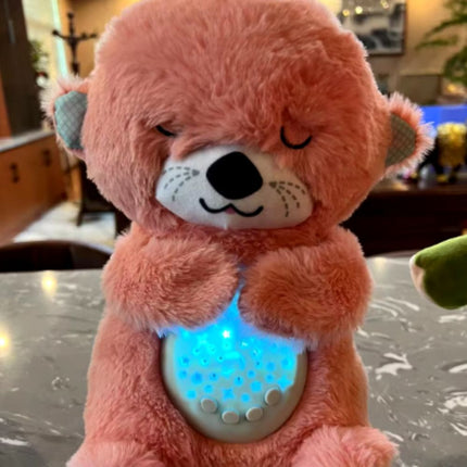 Spící plyšová vydra s uklidňujícím světlem