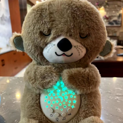 Spící plyšová vydra s uklidňujícím světlem