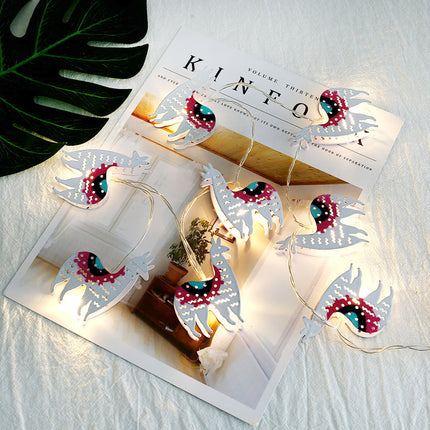 Dekorační světelný řetěz ve tvaru lamy