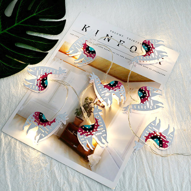 Dekorační světelný řetěz ve tvaru lamy