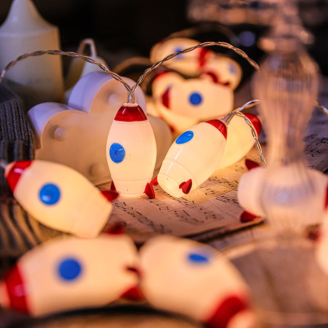 Dětský světelný řetěz s LED raketami