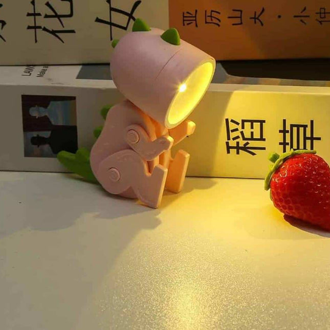 Nastavitelná LED lampička na čtení dinosaurus